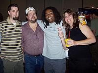 Jaye Miller & Darren Ehlers from OpenUI Consortium in the middle - with the stop light hat with a Miva dude and dudette.